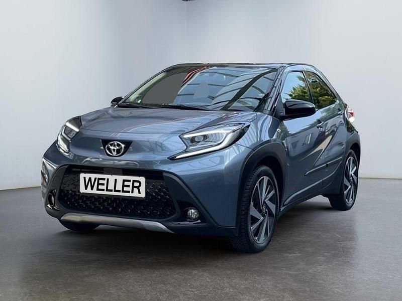 Celestite grey (1k3)/ black mi Neu 2025 Toyota Aygo X X-plore SUV | 23.480 € (Etwas zu teuer) - Bild 1/3