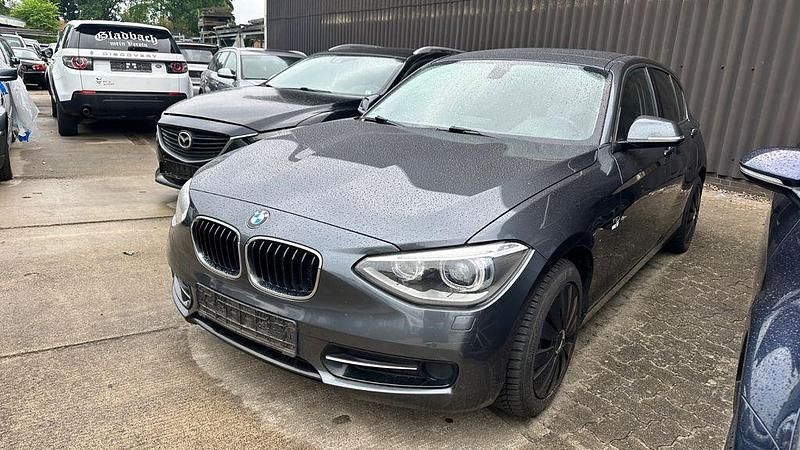Grau Gebraucht 2014 BMW 114 Sport Line Kleinwagen | 5.500 € (Guter Preis) - Bild 1/4