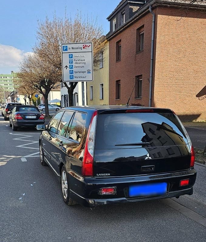 Gebraucht Mitsubishi Lancer 101 PS (74 kW) 2006 Schwarz Kombi