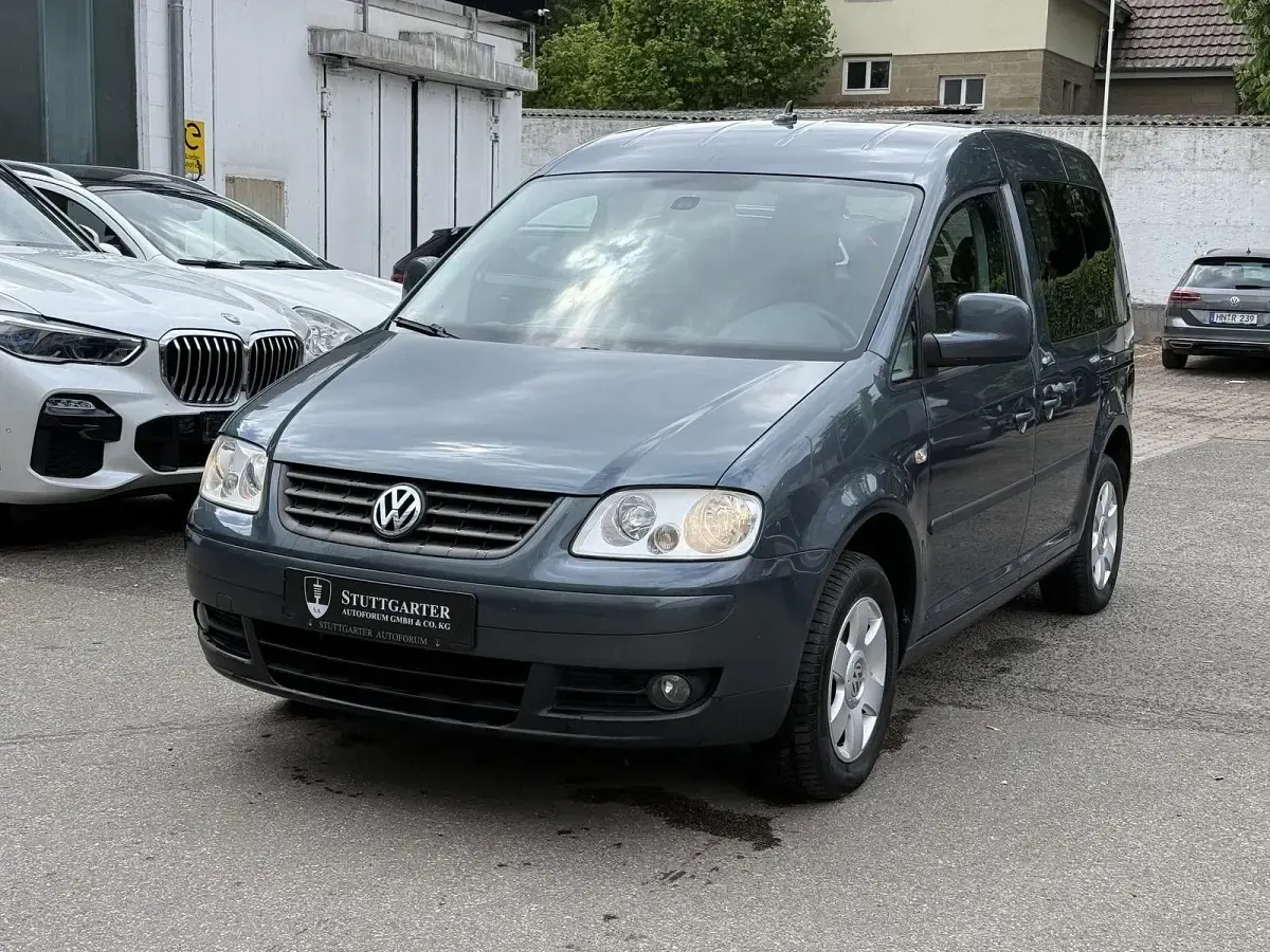 Second-hand VW Caddy Team 109 CP (80 kW) 2009 Gri Monovolum