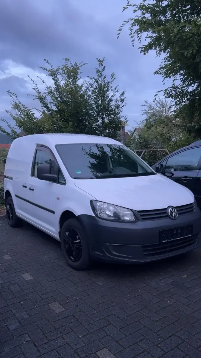 Używany VW Caddy 109 KM (80 kW) 2013 Biały Minivan