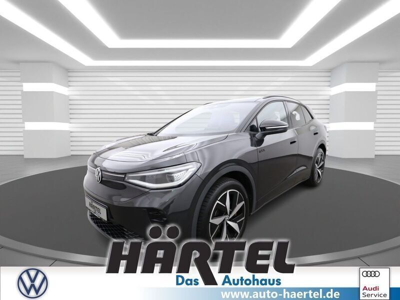 Mangangrau (grey), metallic Gebraucht 2022 VW ID.4 GTX SUV | 35.600 € (Guter Preis) - Bild 1/4