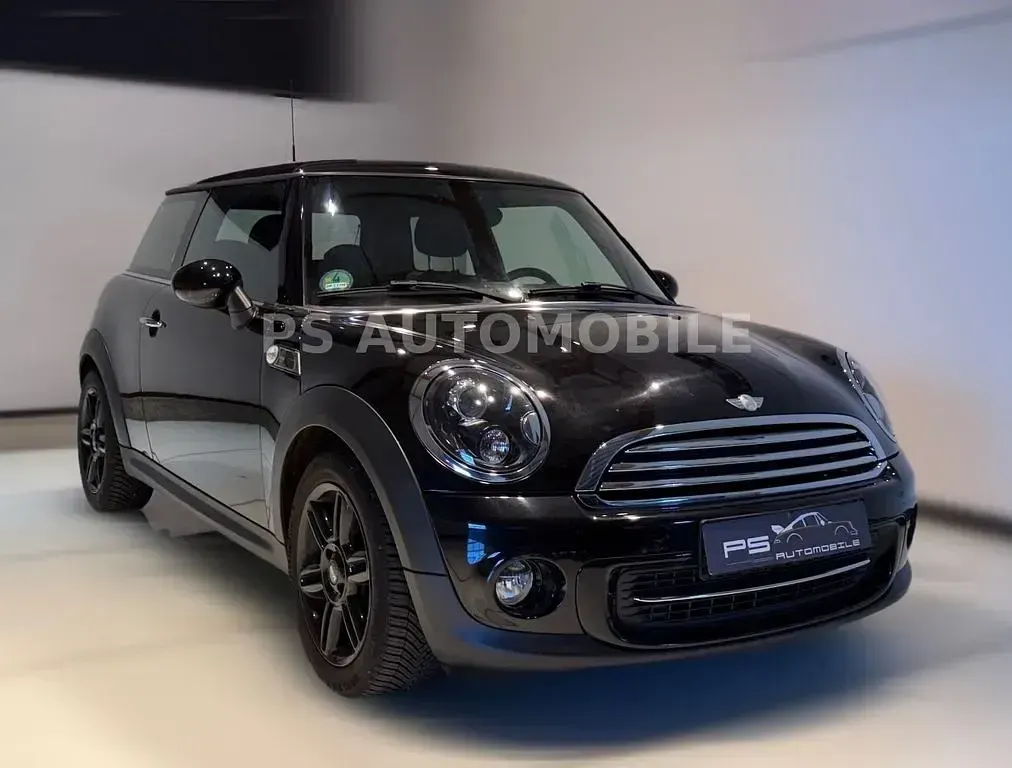 Gebraucht Mini Cooper 122 PS (89 kW) 2012 Midnight black metallic Kleinwagen