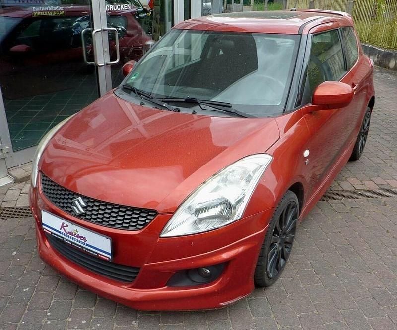 Orange Gebraucht 2011 Suzuki Swift Comfort Limousine | 5.800 € (Fairer Preis) - Bild 1/4