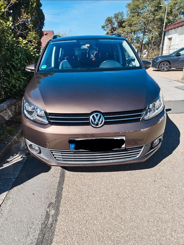 Gebraucht VW Touran 105 PS (77 kW) 2011 Braun Van / Kleinbus