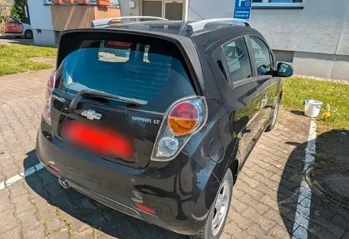 Second-hand Chevrolet Spark 80 CP (58 kW) 2011 Negru Hatchback