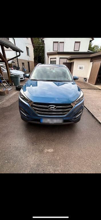 Blau Gebraucht 2016 Hyundai Tucson Premium SUV | 13.800 € (Guter Preis) - Bild 1/4
