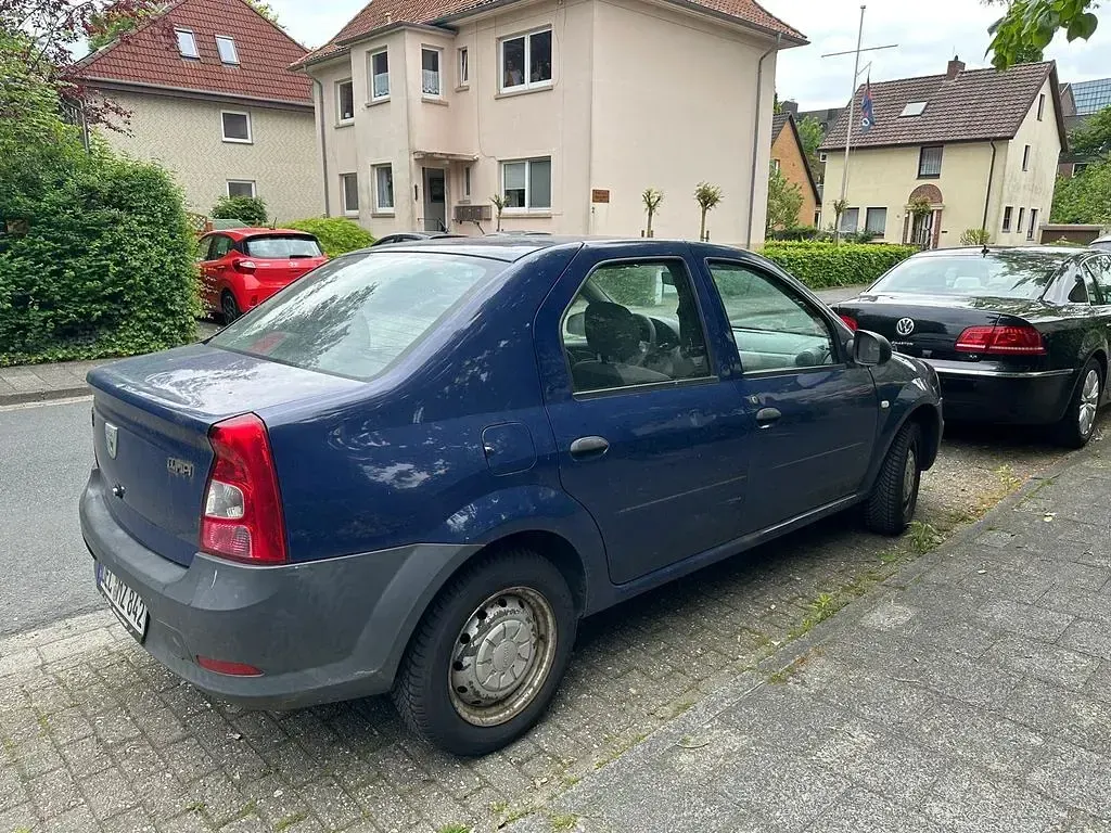 Używany Dacia Logan 75 KM (55 kW) 2009 Purpurowy Sedan/Limuzyna