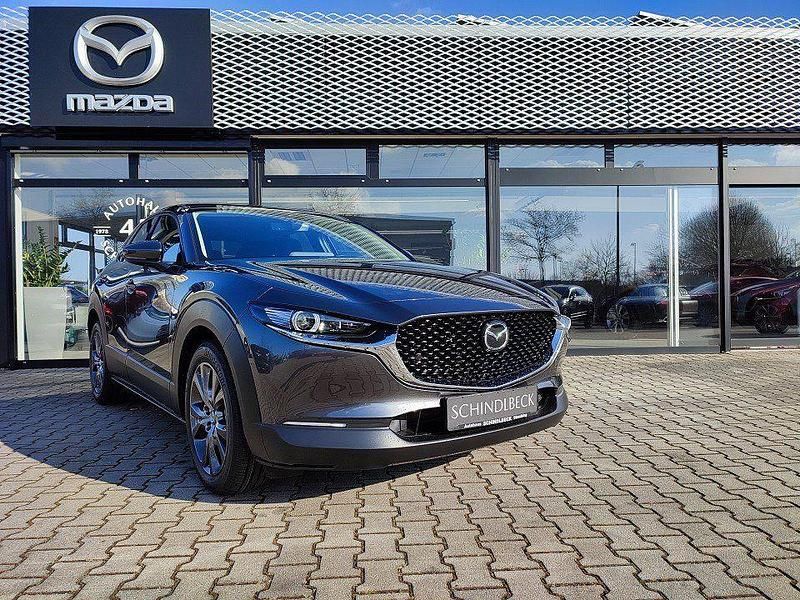 Machine gray (metallic) Gebraucht 2022 Mazda CX-30 Selection SUV | 21.900 € (Fairer Preis) - Bild 1/4