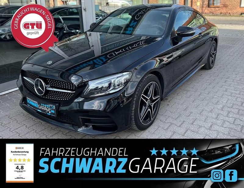 Obsidianschwarz metalliclack Gebraucht 2020 Mercedes C220 AMG line Coupé | 33.890 € (Fairer Preis) - Bild 1/4