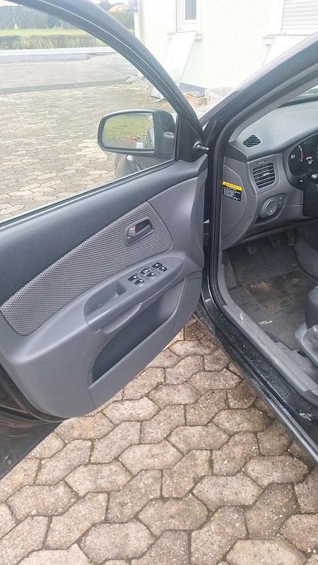 Gebraucht Kia Rio 97 PS (71 kW) 2009 Schwarz Kleinwagen