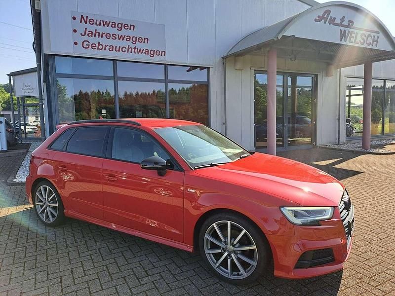 Tangorot Gebraucht 2018 Audi A3 Sportback Limousine | 21.390 € (Teuer) - Bild 1/4