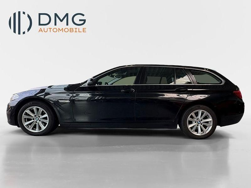 Gebraucht BMW 518 Sport Line 143 PS (105 kW) 2014 Black sapphire metallic Kombi