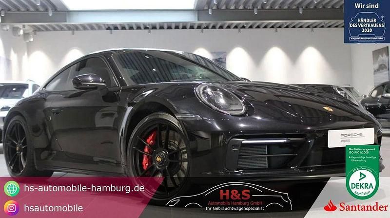 Tiefschwarz Gebraucht 2024 Porsche 911 Carrera 4 GTS Coupé | 157.900 € (Fairer Preis) - Bild 1/4