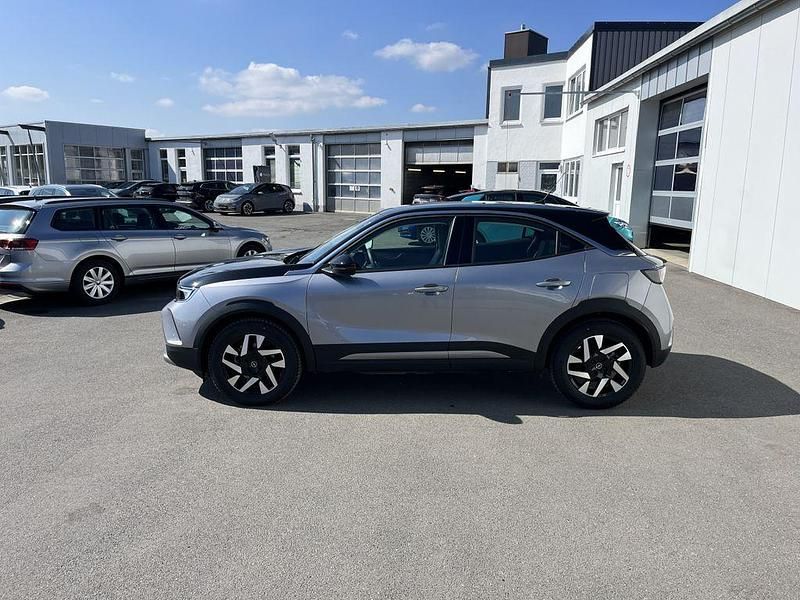 Gebraucht Opel Mokka-e Elegance 100 kW (136 PS) 2024 Kontrast grau SUV