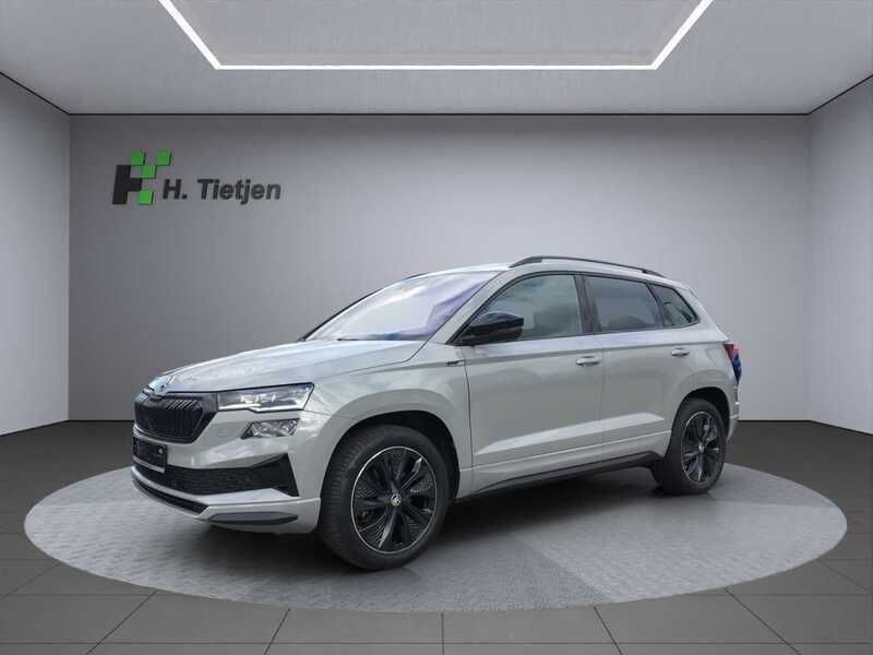 Grau Gebraucht 2024 Skoda Karoq SportLine SUV | 37.490 € (Etwas zu teuer) - Bild 1/4