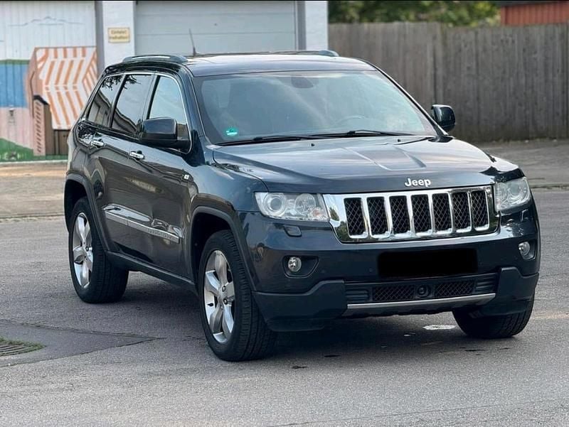 Grau Gebraucht 2012 Jeep Grand Cherokee SUV | 8.600 € (Guter Preis) - Bild 1/4