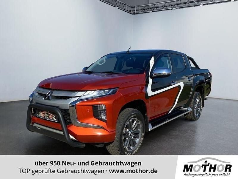 Zirkonorange Gebraucht 2021 Mitsubishi L200 Spirit Abholung | 29.880 € (Fairer Preis) - Bild 1/4