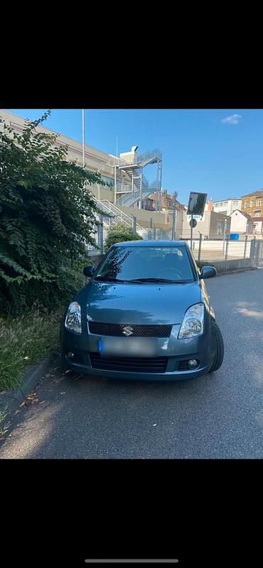 Grau Gebraucht 2007 Suzuki Swift Kleinwagen | 3.800 € (Etwas zu teuer) - Bild 1/4