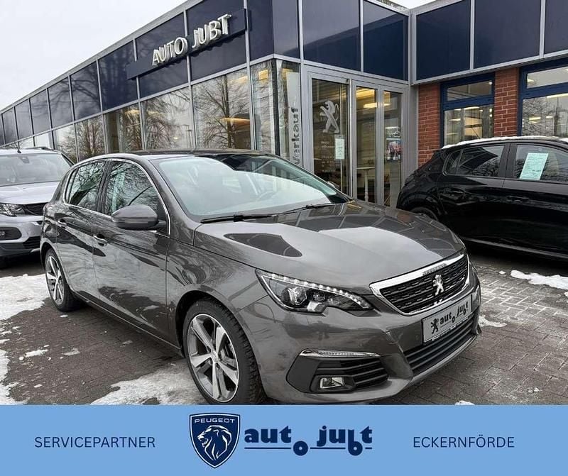 Platiniumgrau metallic Gebraucht 2018 Peugeot 308 Allure Kleinwagen | 10.990 € (Fairer Preis) - Bild 1/4