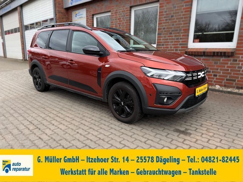 Braun Gebraucht 2023 Dacia Jogger Extreme Limousine | 19.490 € (Fairer Preis) - Bild 1/4