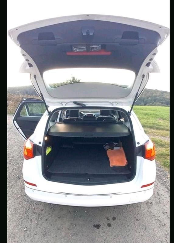 Gebraucht Opel Astra 110 PS (80 kW) 2014 Weiß Kombi