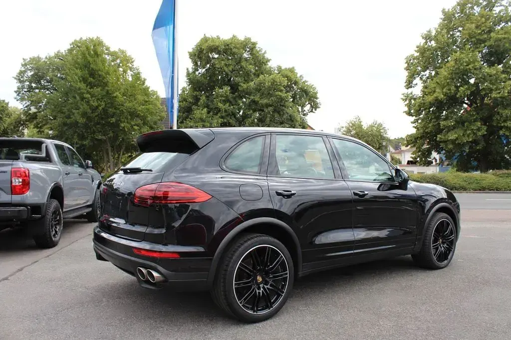 Gebraucht Porsche Cayenne 385 PS (283 kW) 2015 Tiefschwarzmetallic SUV