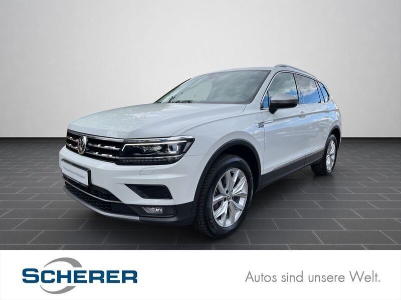 Pure white (metallic) Gebraucht 2021 VW Tiguan Allspace Highline SUV | 31.800 € (Fairer Preis) - Bild 1/4