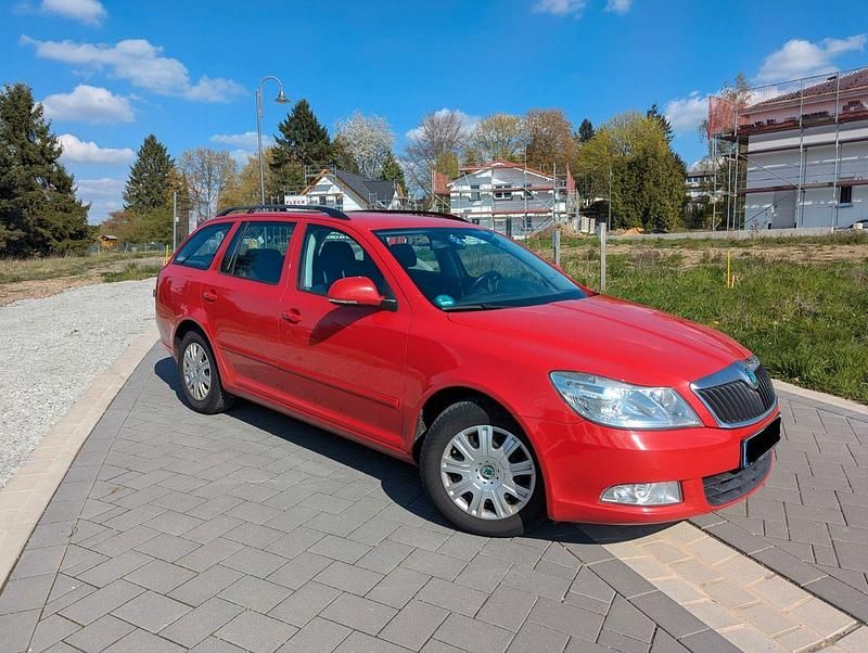 Second-hand Skoda Octavia Ambition 105 CP (77 kW) 2013 Roșu Break