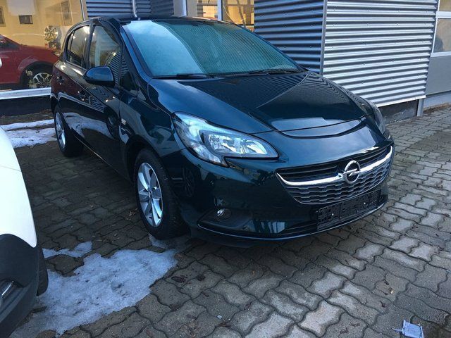 Grün metallic Gebraucht 2015 Opel Corsa drive Limousine | 12.990 € - Bild 1/1