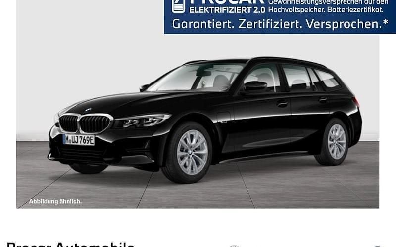 Schwarz Gebraucht 2022 BMW 320e Advantage Kombi | 28.900 € (Fairer Preis) - Bild 1/4