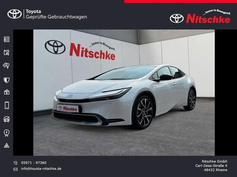 Platinum white pearl mc. Gebraucht 2023 Toyota Prius Plug-in Hybrid Executive Kleinwagen | 41.990 € - Bild 1/4
