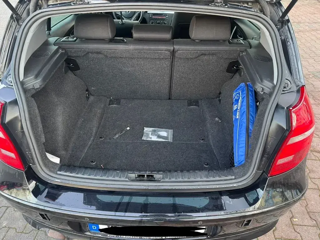 Gebraucht BMW 116 Sport Line 122 PS (89 kW) 2011 Schwarz Kleinwagen