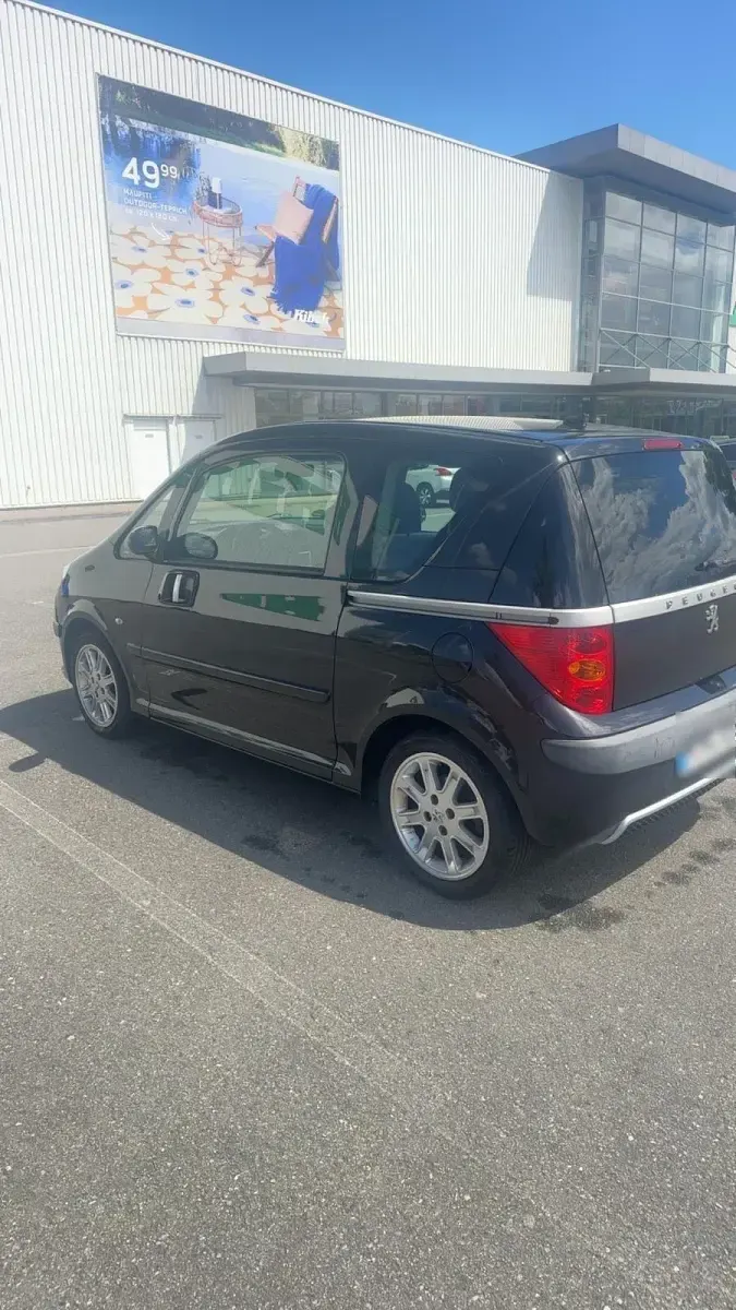 Gebraucht Peugeot 1007 Premium 109 PS (80 kW) 2007 Grau Van / Kleinbus