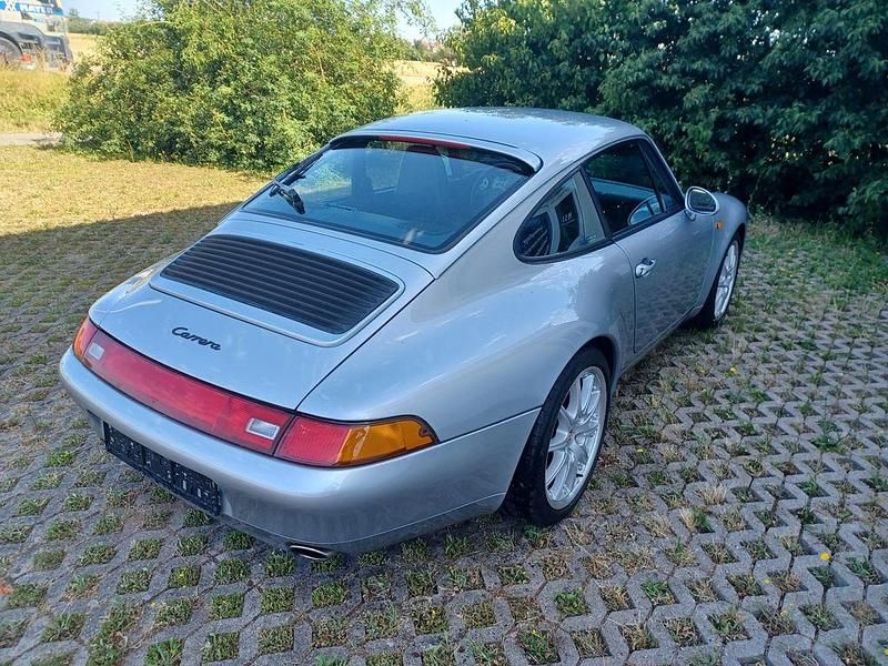 Silber Gebraucht 1995 Porsche 993 Coupé | 77.993 € - Bild 1/4