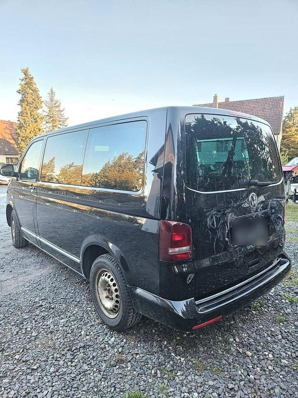 Second-hand VW Caravelle 140 CP (102 kW) 2014 Negru Van