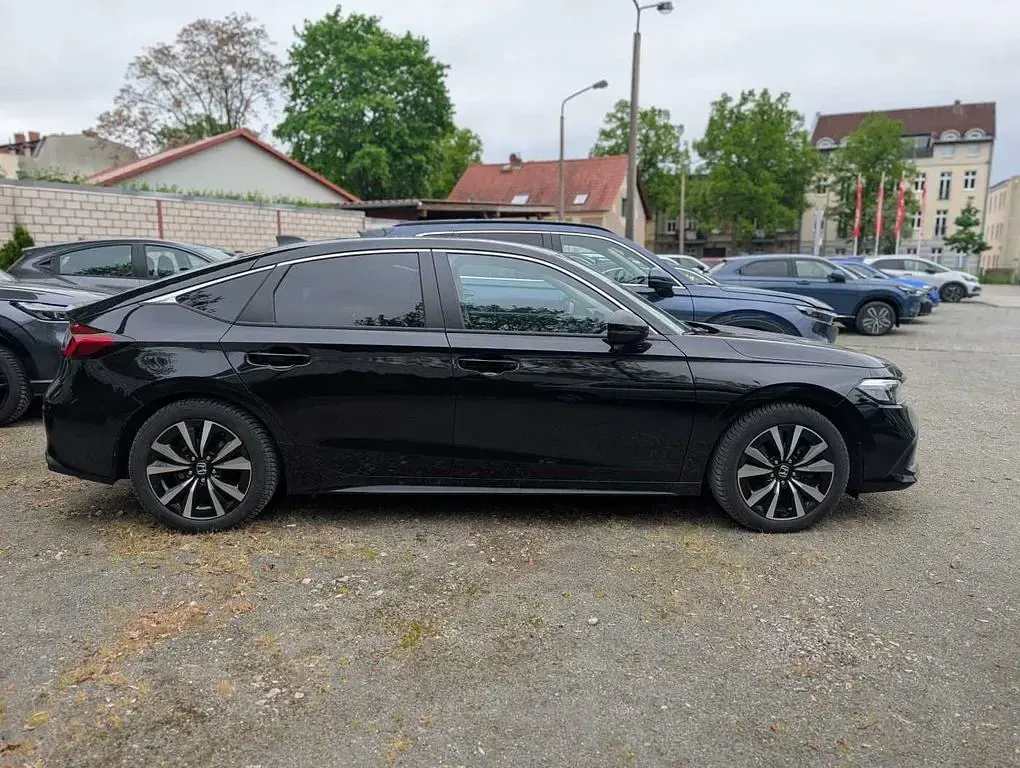 Gebraucht Honda Civic Elegance 184 PS (135 kW) 2023 Schwarz Limousine