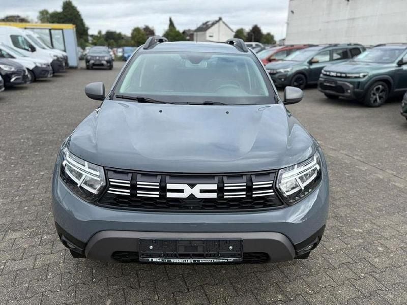 Städtisches grau Gebraucht 2024 Dacia Duster Journey SUV | 22.950 € (Guter Preis) - Bild 1/4