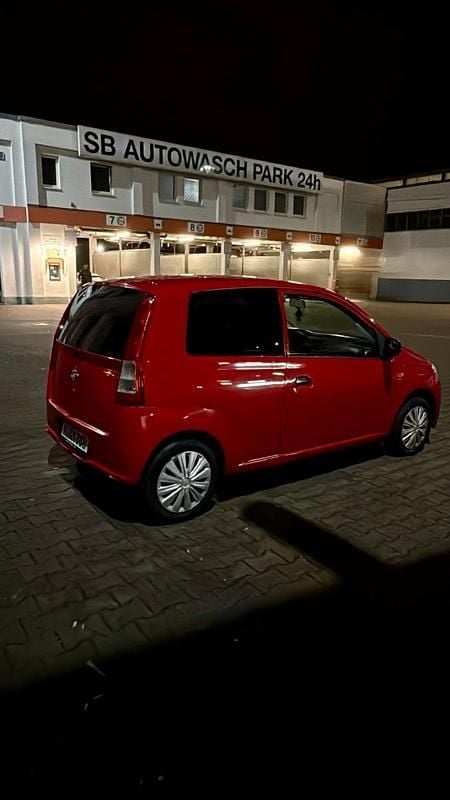 Rot Gebraucht 2005 Daihatsu Cuore Kleinwagen | 800 € (Fairer Preis) - Bild 1/4