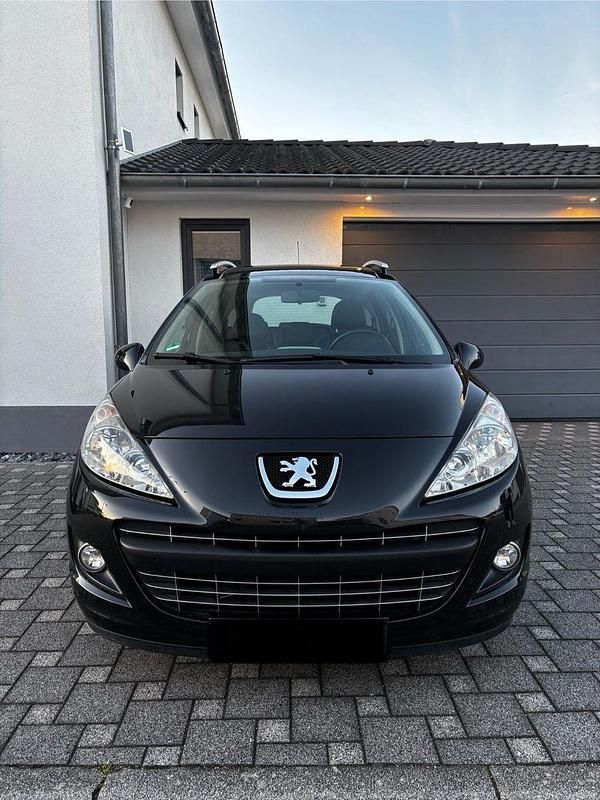 Gebraucht Peugeot 207 120 PS (88 kW) 2011 Schwarz Kombi