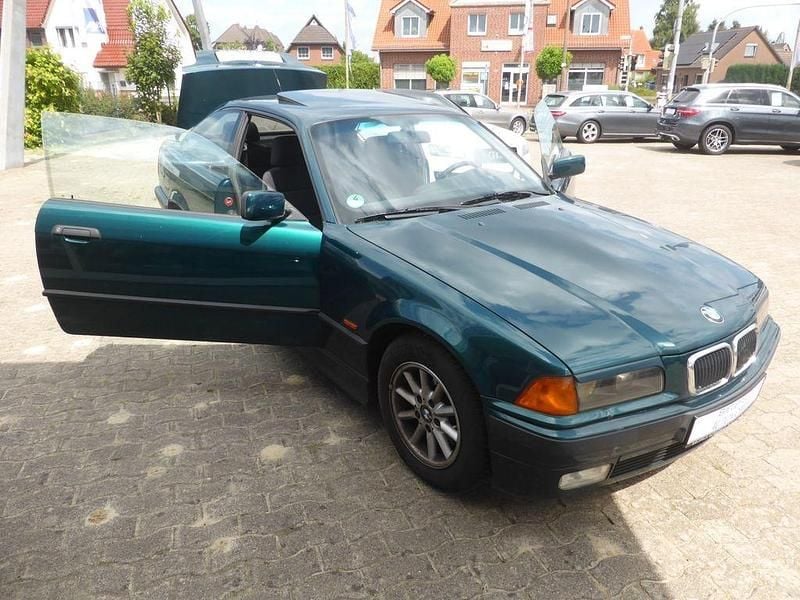 Bostongrün Gebraucht 1997 BMW 316 Performance Coupé | 999 € (Superpreis) - Bild 1/4
