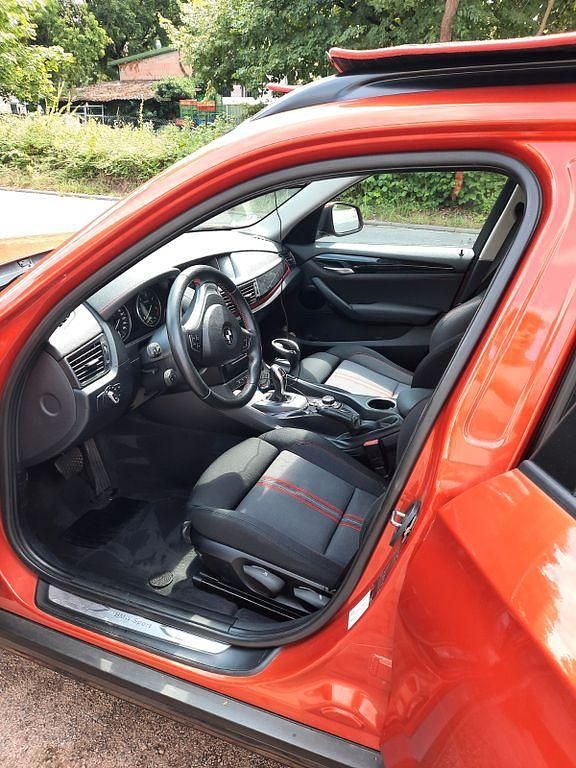 Gebraucht BMW X1 Sport Line 143 PS (105 kW) 2014 Orange SUV