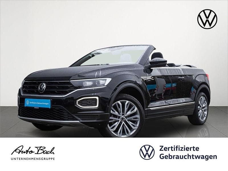 Schwarz (deep black perleffekt/schwarz) Gebraucht 2021 VW T-Roc Cabriolet Active Cabrio | 24.440 € (Guter Preis) - Bild 1/4