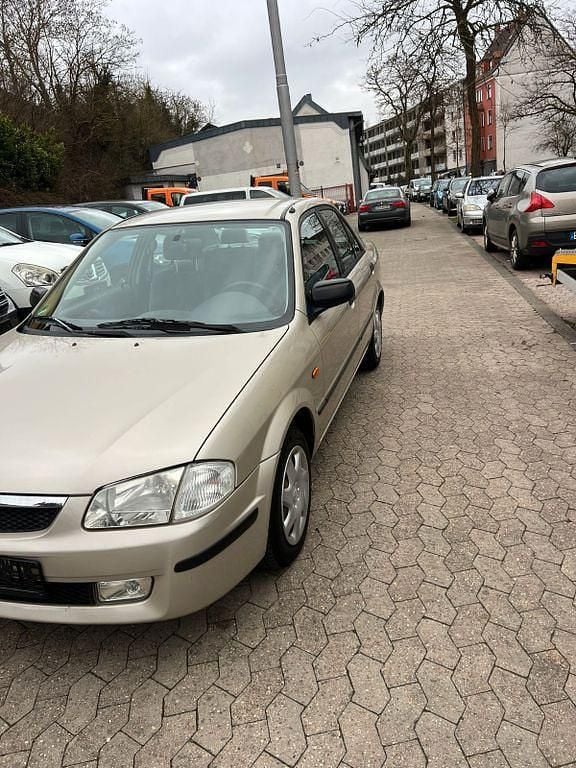 Gebraucht Mazda 323 88 PS (64 kW) 1999 Grau Limousine