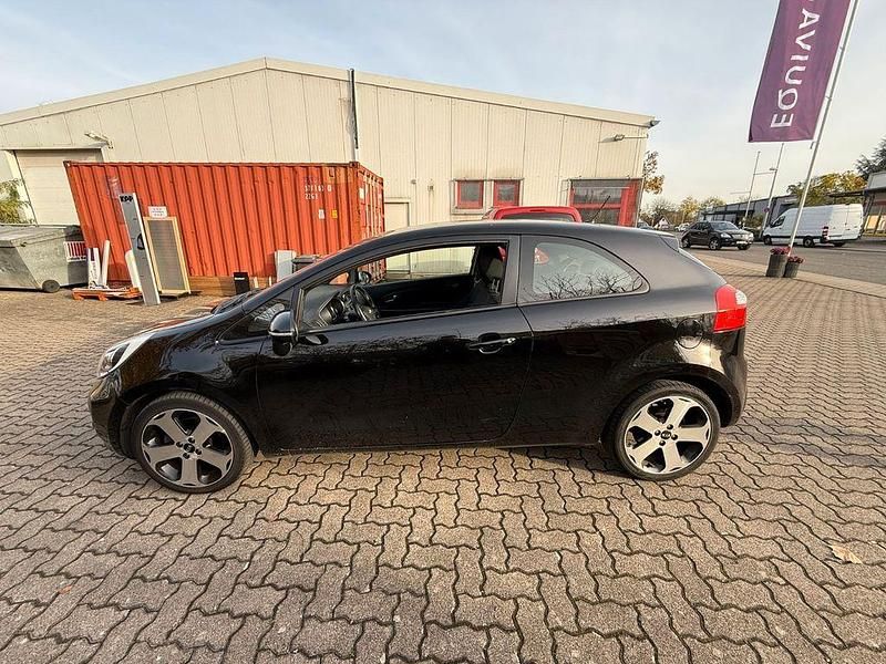 Schwarz Gebraucht 2012 Kia Rio Spirit Kleinwagen | 5.900 € (Fairer Preis) - Bild 1/4