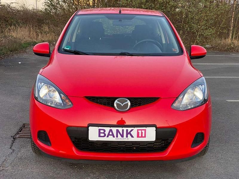 Second-hand Mazda 2 Inclusive 68 CP (50 kW) 2009 Roșu Hatchback