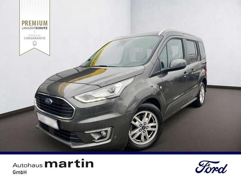 Grau Gebraucht 2021 Ford Tourneo Titanium Van / Kleinbus | 20.990 € (Guter Preis) - Bild 1/2