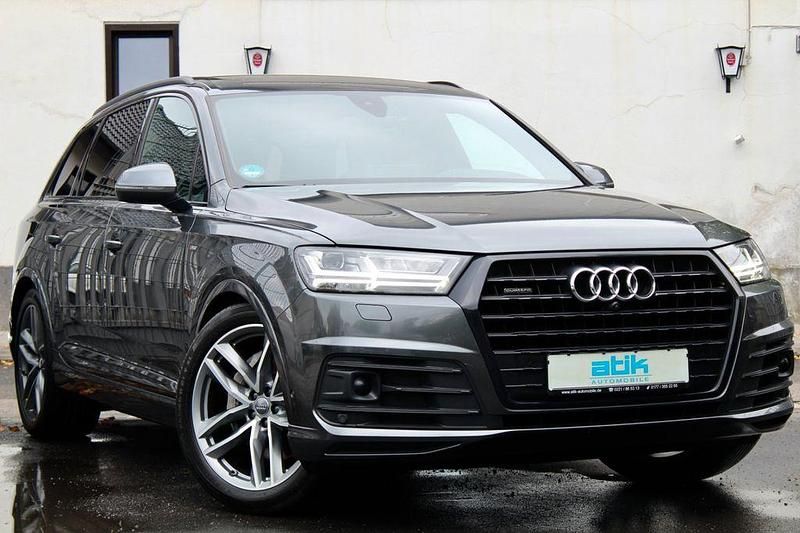 Grau Gebraucht 2018 Audi Q7 Exclusive SUV | 45.850 € (Teuer) - Bild 1/4