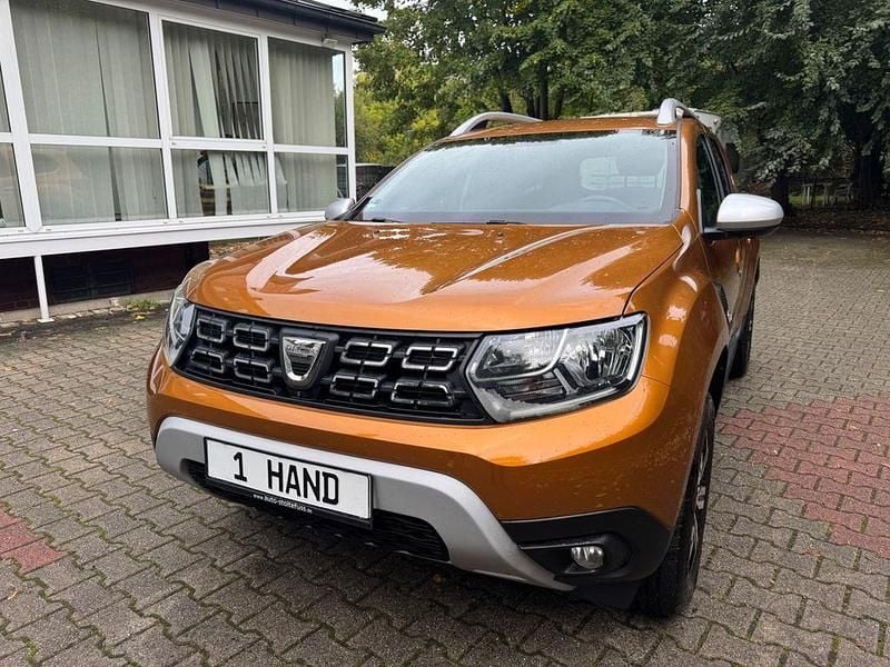 Orange Gebraucht 2021 Dacia Duster Prestige SUV | 13.900 € (Fairer Preis) - Bild 1/4