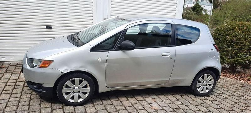 Second-hand Mitsubishi Colt Motion 75 CP (55 kW) 2009 Argintiu Hatchback